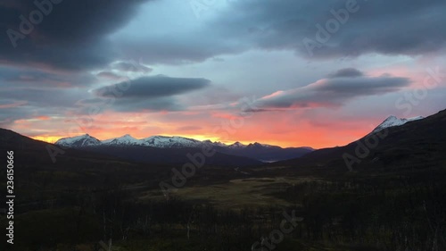 time lapse of orange sunset in Gratangen, Norway photo