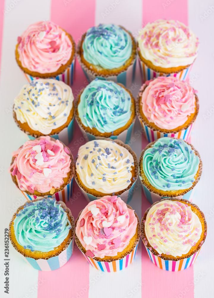 Cupcakes with pink, white and blue icing 