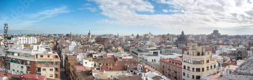 A landscape of Valencia as seen from the Torres de Serrans (Serranos Gate) during a sunny winter day with blue sky and clouds, Spain © Isacco