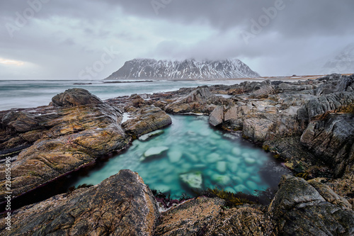 Fototapeta Naklejka Na Ścianę i Meble -  Rocky coast of fjord in Norway