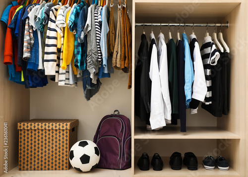 Large wardrobe with teenager clothes, shoes and accessories