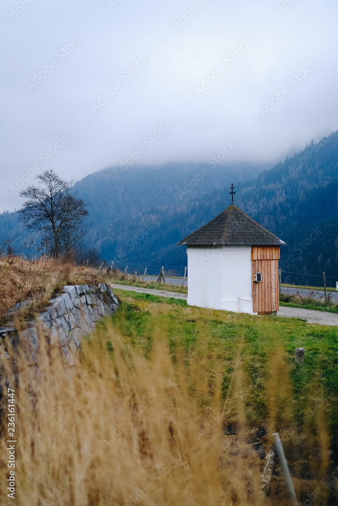 old wooden chapel in the mountains