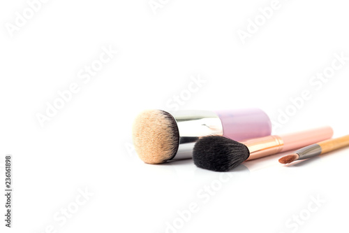 Cosmetic makeup brush, isolated on a white background.