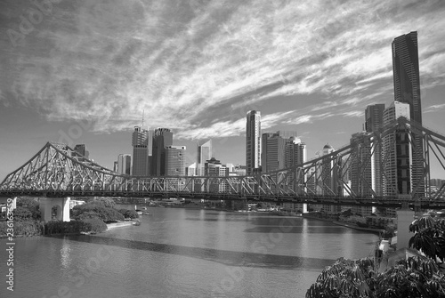 Story Bridge and skyscraper of Brisbane under blue skys with clouds © Alexander
