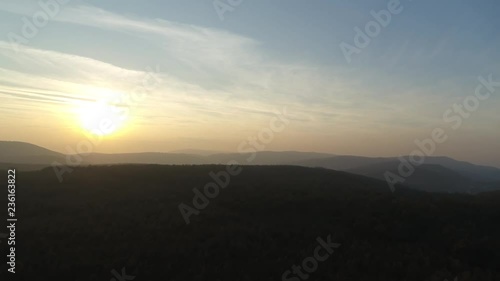 Wallpaper Mural Aerial Sunset in mountains. Drone view on mountains in golden and blue hour Torontodigital.ca