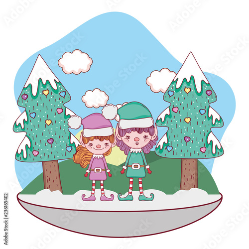 cute santa helpers couple in the snowscape