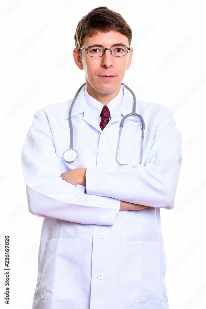 Studio shot of man doctor with arms crossed Studio shot of man doctor with arms crossed