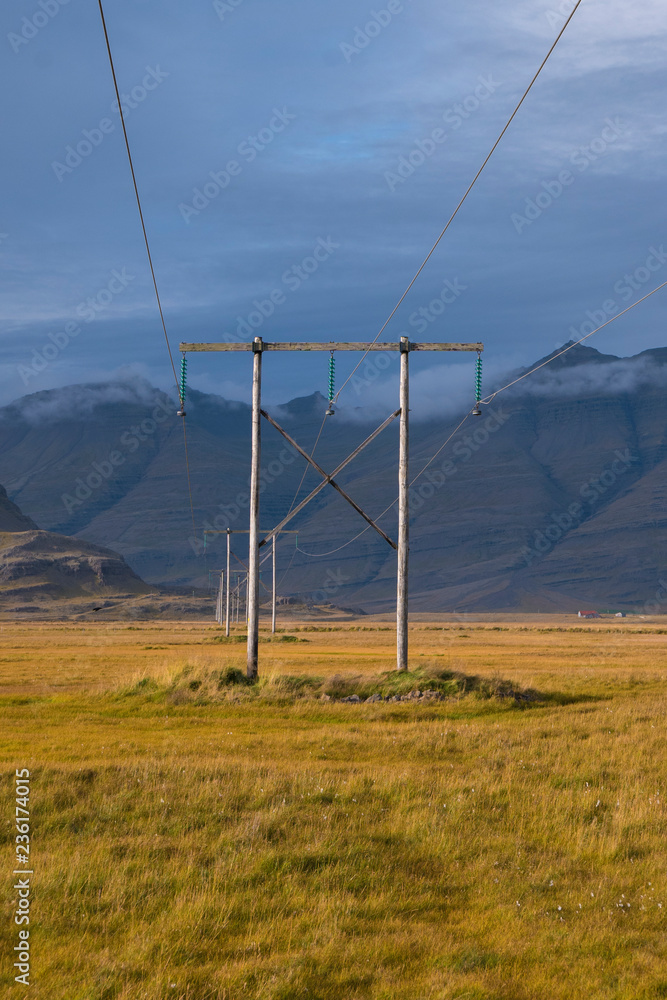 Sunset and power lines in Icelandic landscape