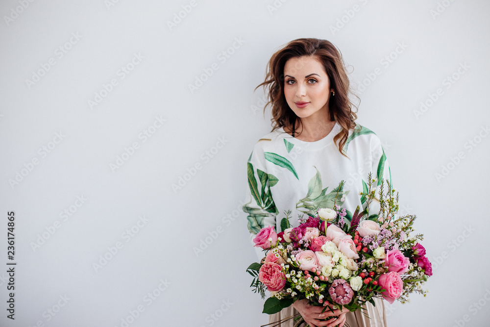 Florist makes a bouquet. Florist makes a bouquet.