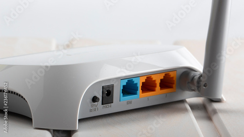 isolated white access point on table in office