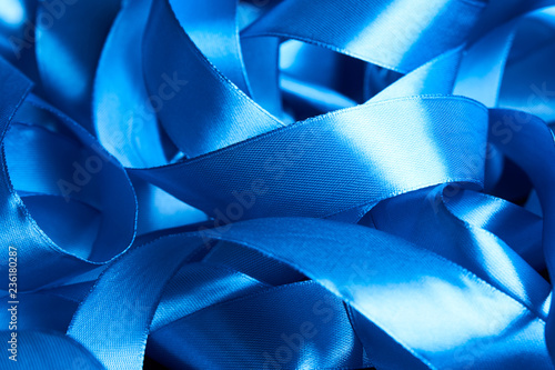 Blue satin fabric ribbon as abstract romantic background