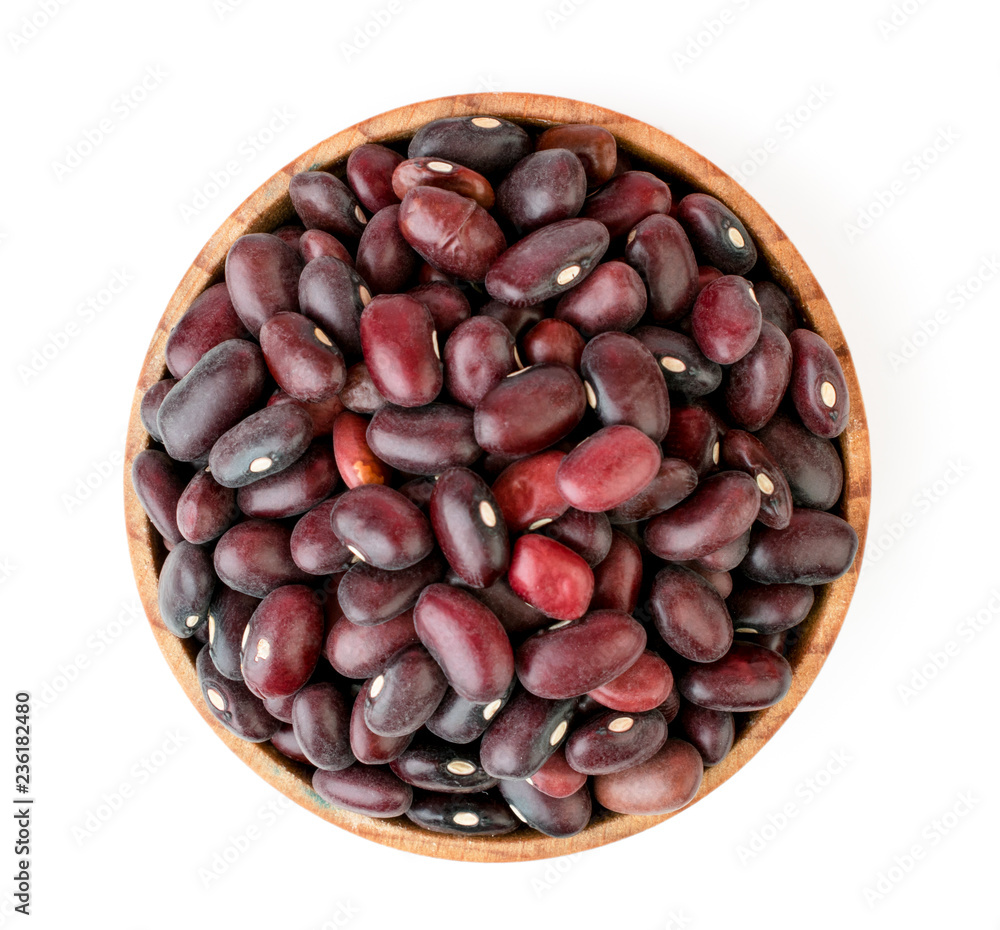 Red beans in wooden plate on a white. The view from the top. Red beans in wooden plate on a white. The view from the top.