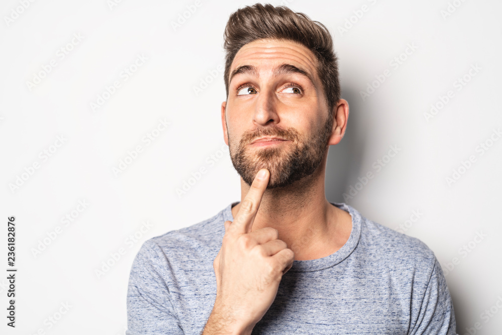 A nice guy in studio white, pointing something A nice guy in studio white, pointing something