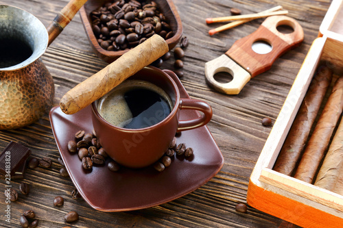 Cigars and a cup of black coffee