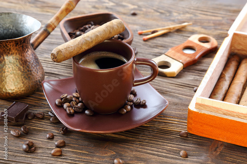 Cigars and a cup of black coffee