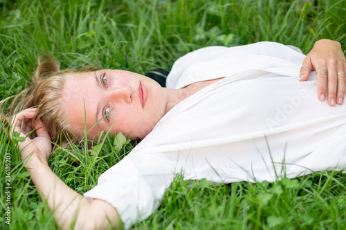 Young woman relaxing on the grass