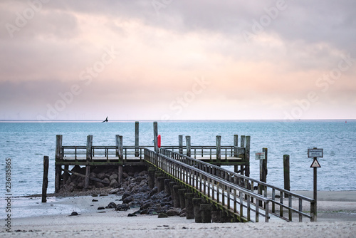 Pier at the beach of Wyk on the German Island of Foehr in cold November