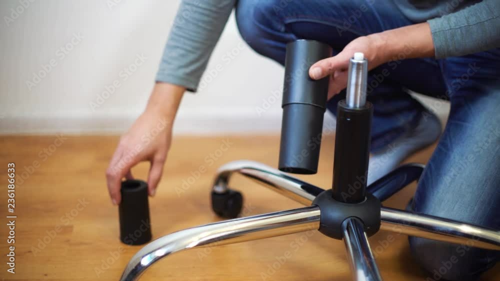 man hands assembling office chair. Furniture, office, assembly concept man hands assembling office chair. Furniture, office, assembly concept