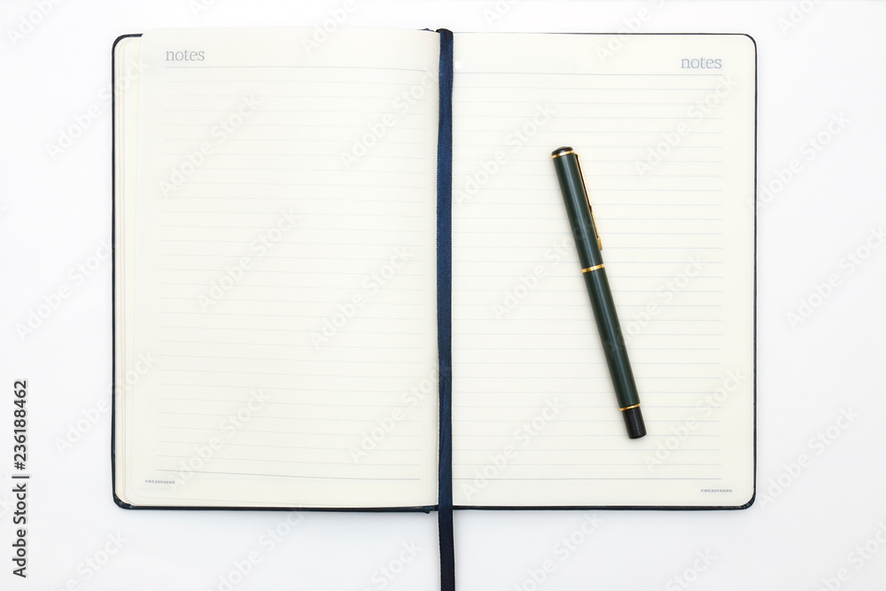 Notebook and pen on white background. Abstract background for drawing and sketching. diary for business and study. Notebook and pen on white background. Abstract background for drawing and sketching. diary for business and study.