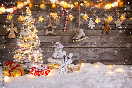 Christmas tree decoration on wooden background