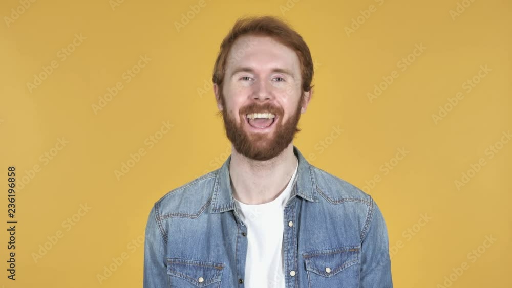 Video Chat by Redhead Man Isolated on Yellow Background, Talking Video Chat by Redhead Man Isolated on Yellow Background, Talking