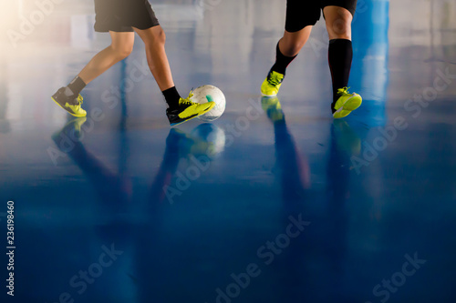 Indoor soccer sports hall. Football futsal player, ball, futsal floor. photo