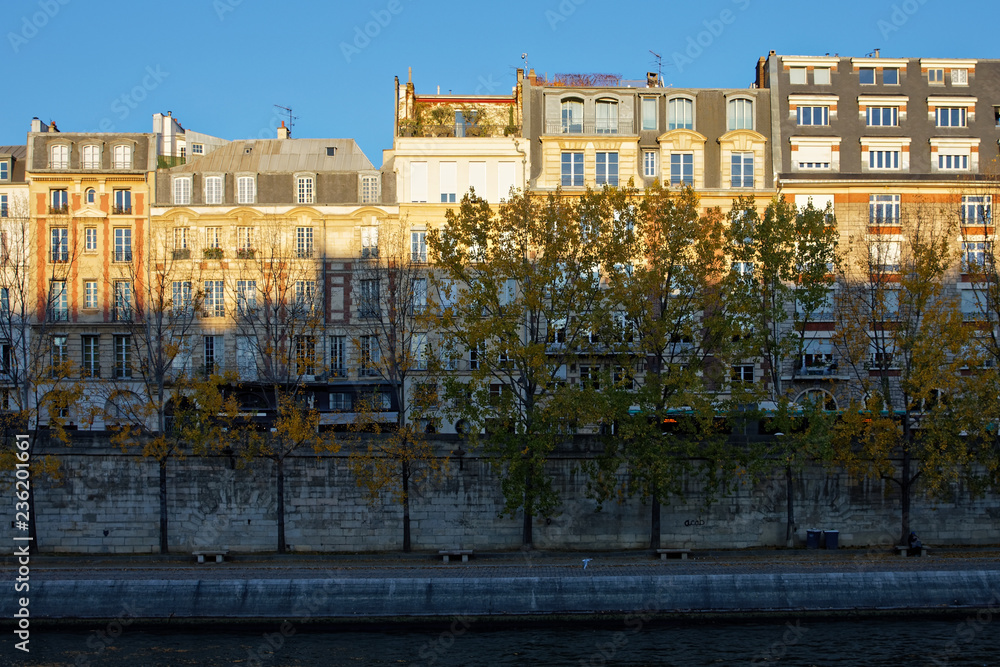 Paris, France - November 18, 2018: Haussmann buildings along the bank of river Seine