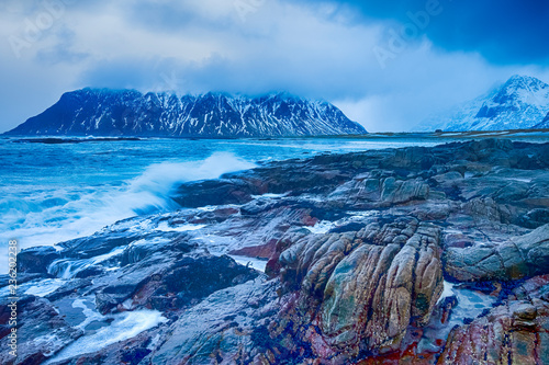 Amazing and Picturesque Norwegian Skagsanden Beach At Early Spring Time. Splashes of Ocean Waves. photo