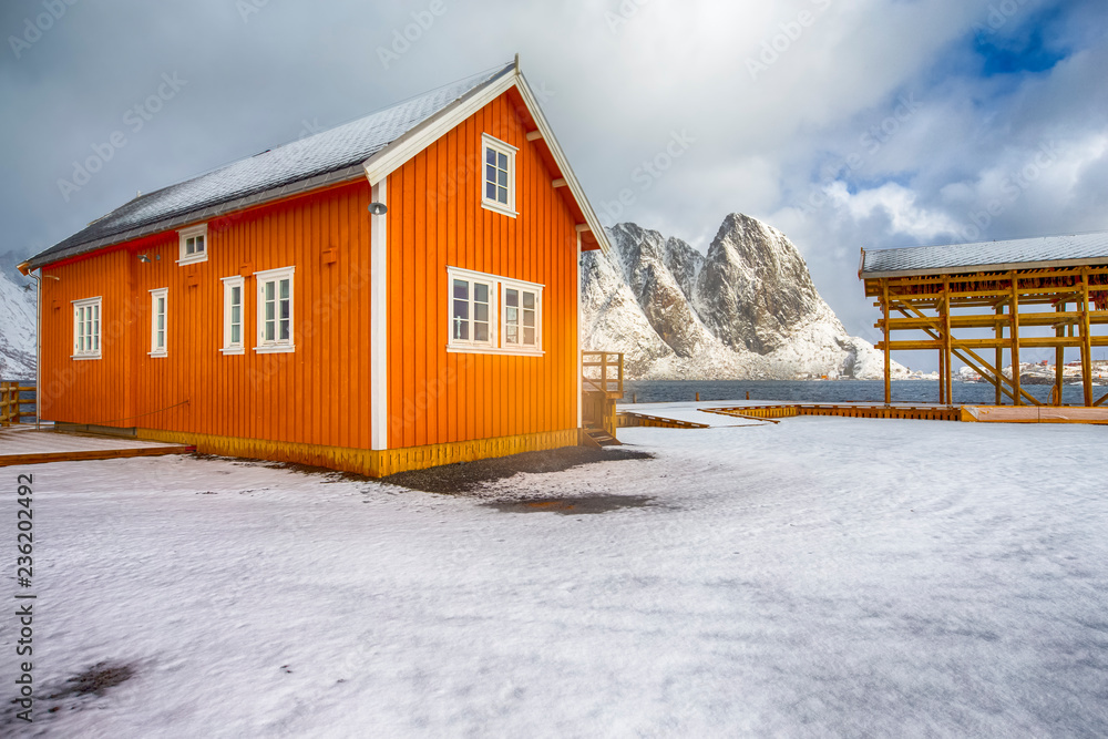 Yellow Traditional Rorbu House in Sakrisoy Fishing Village in Winter at Lofoten Islands in Wonderful Norway Yellow Traditional Rorbu House in Sakrisoy Fishing Village in Winter at Lofoten Islands in Wonderful Norway