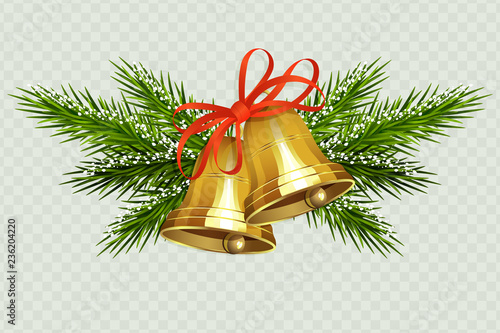 Christmas composition with two golden bells with a red ribbon and spruce twigs in the snow