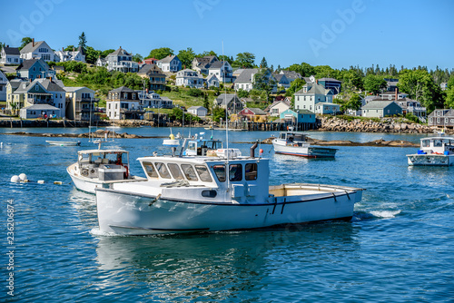 Maine Lobster Boats Anchored in the Bay in Front of a Quaint New England Village