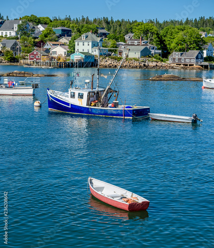 Maine Lobster Boats Anchored in a Bay in Front of a Quaint New England Village