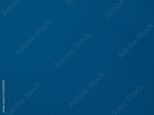 Texture of blue colored paper. Can be used as a background