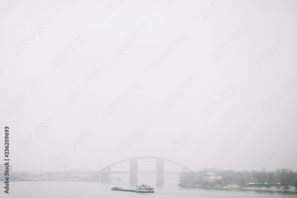 Kyiv, Ukraine-November 28, 2018: landscape view of Bridge over Dnieper River in Kyiv. Kyiv, Ukraine-November 28, 2018: landscape view of Bridge over Dnieper River in Kyiv.