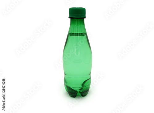 Full green plastic bottles isolated on white background