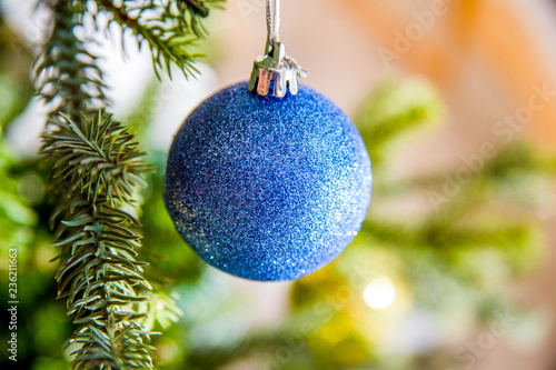 blue christmas ball on tree