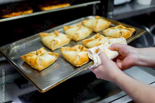 different kinds of pastry are being cooked