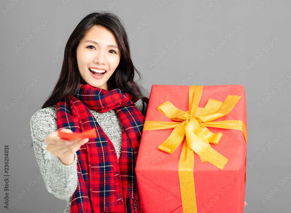 asian woman showing red envelopes and gift for chinese new year asian woman showing red envelopes and gift for chinese new year