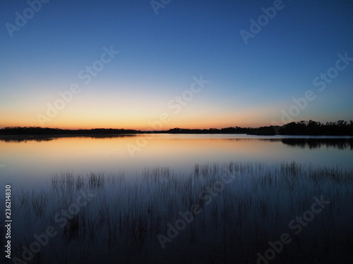 Sunrise on a perfectly calm Nine Mile Pond in Everglades National Park, Florida.