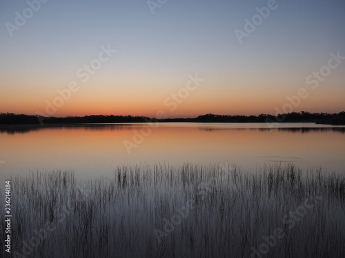 Sunrise on a perfectly calm Nine Mile Pond in Everglades National Park  Florida.