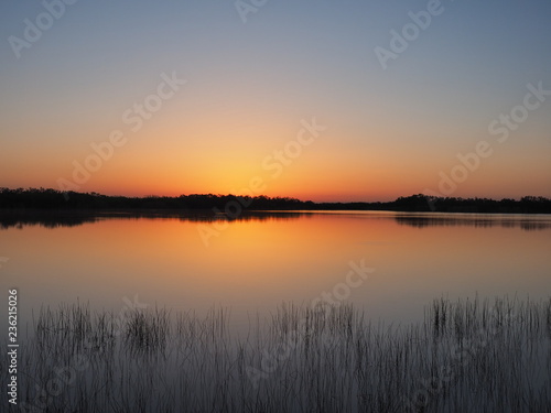 Sunrise on a perfectly calm Nine Mile Pond in Everglades National Park  Florida.