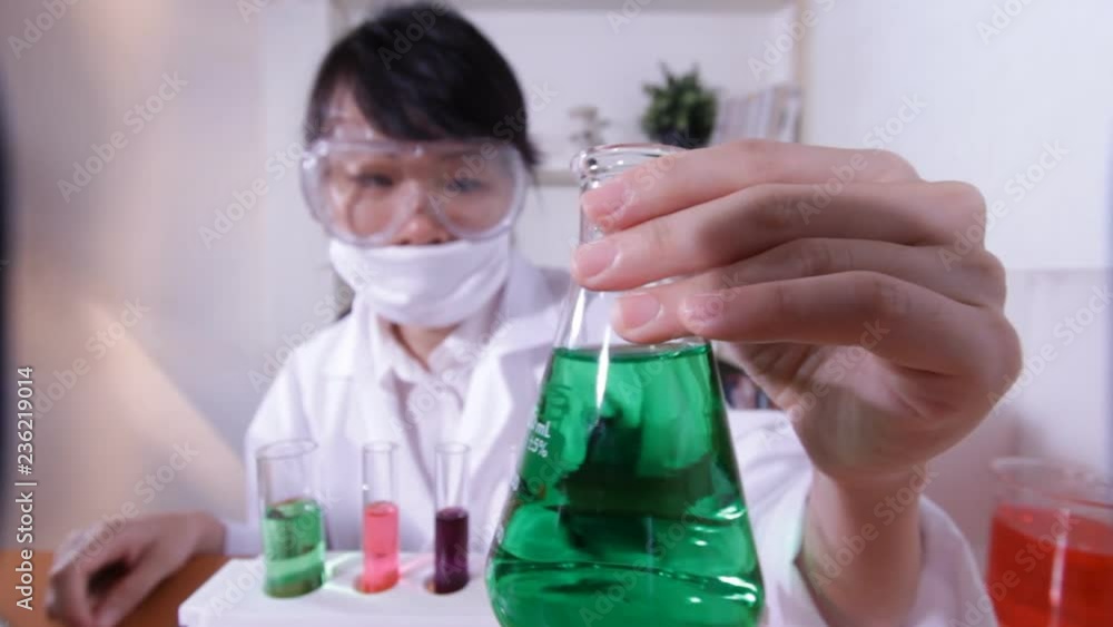Asian female scientist researching at laboratory Asian female scientist researching at laboratory