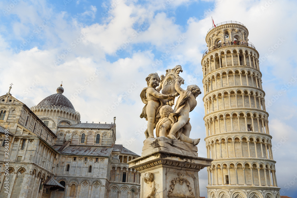 Putti Fountain and Leaning Tower. Pisa, Italy