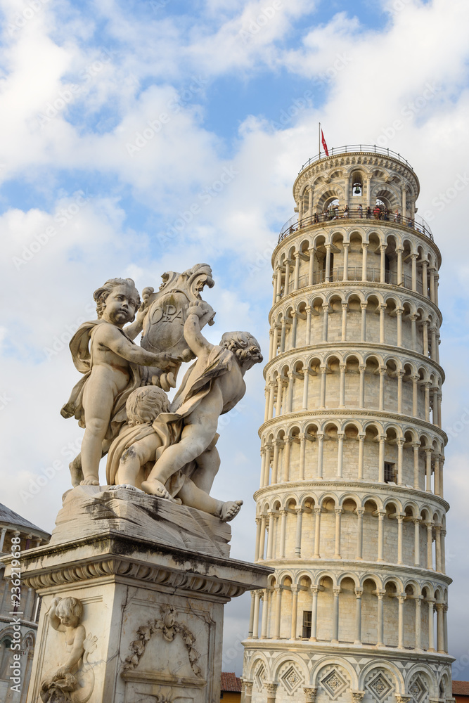 Putti Fountain and Leaning Tower. Pisa, Italy