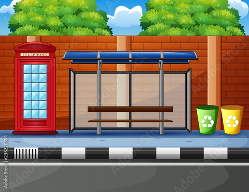 cartoon of a bus stop, telephone box and trash can in the edge highway