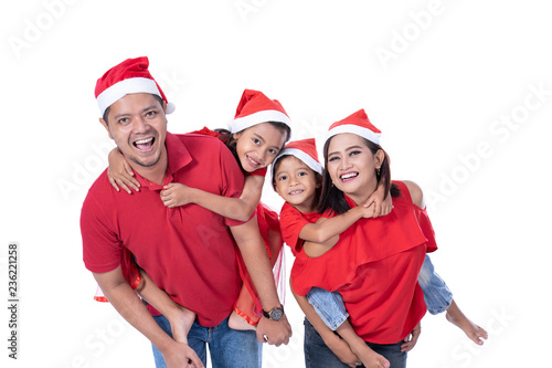 happy asian family wearing red christmas photo