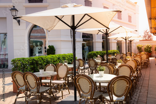 Background of outdoor cafe in Milan, Italy. Summer season.