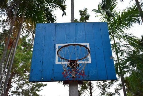 Old Blue backboard of Basketball - Basketball hoop. photo