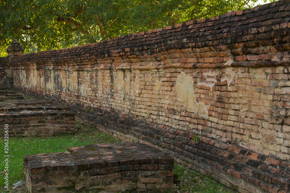Old temple wall  in Thai temple (Wat Thai) Phichit historian park ,The landmark in Phichit province Thailand