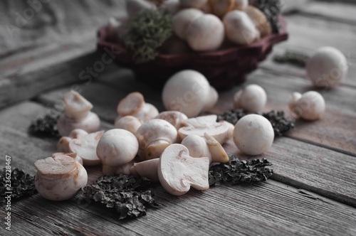 white mushrooms on a wooden table